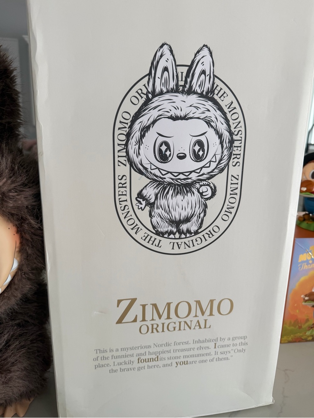 Zimomo from popmart with box and bag